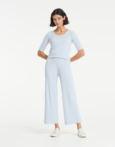Ecru ladies knitted trousers with hem